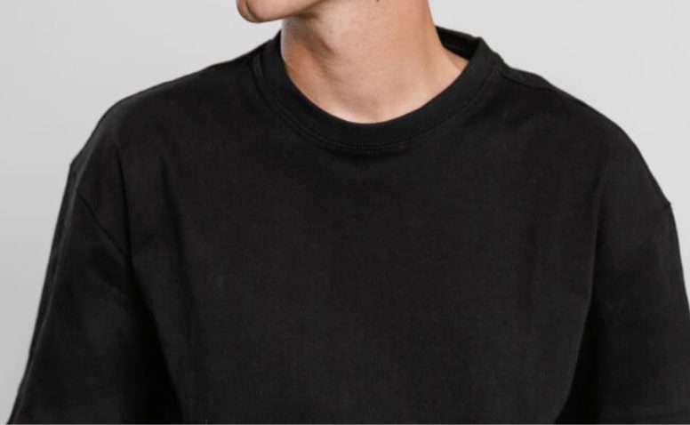 Close-up of a black heavyweight crew-neck tee