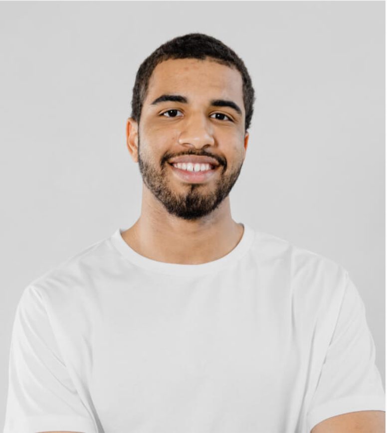 Smiling man wearing a white Saltbox Threads tee